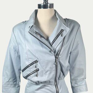 Colombian designer Carlos Merchan's iconic baby blue faux leather mini dress